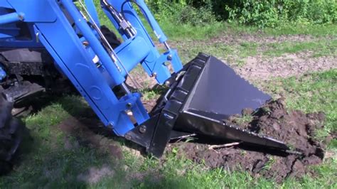 will a skid steer push over trees|skid steer stump bucket.